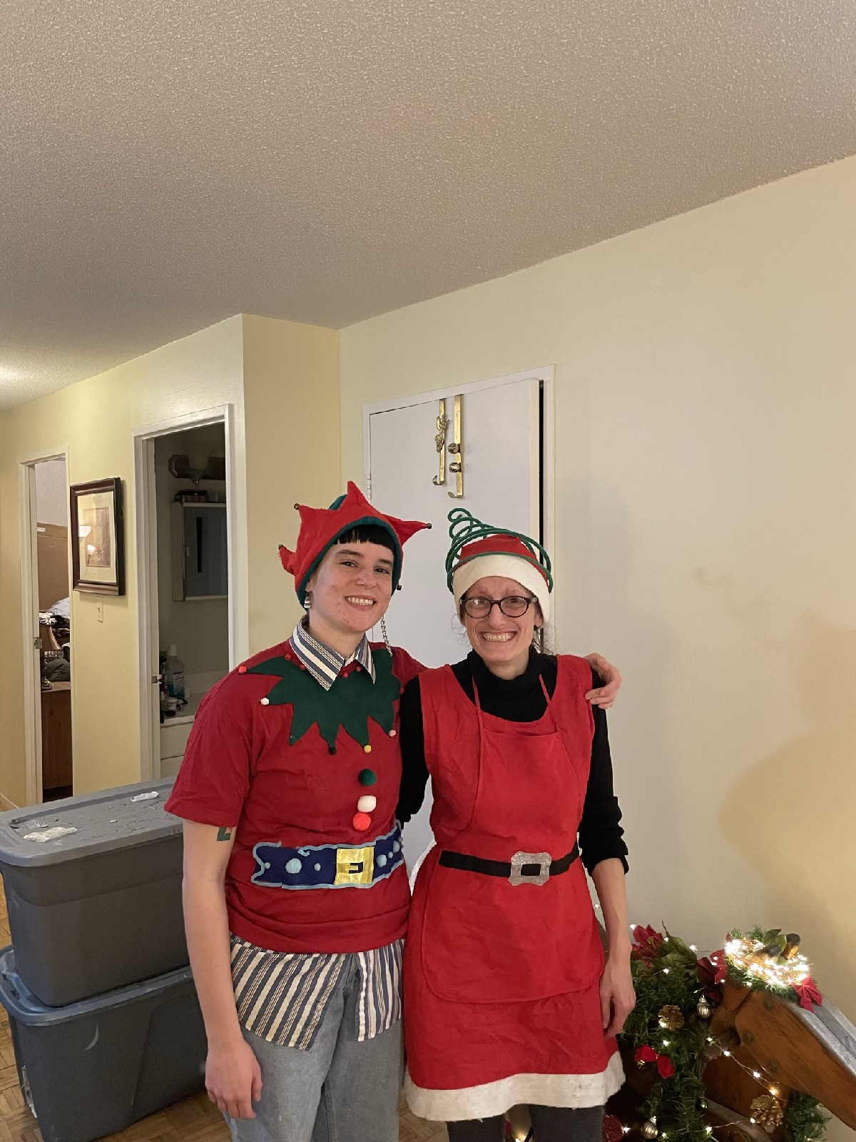 Adriana Violo in costume with a fellow volunteer during Christmas Care Pack Drive preparations