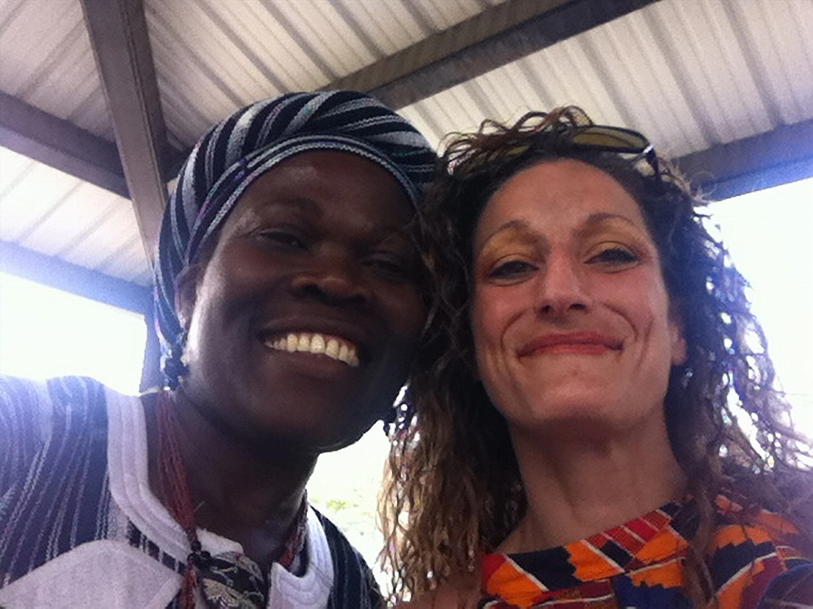 Adriana Violo with a community partner during her advocacy and library work in Ghana