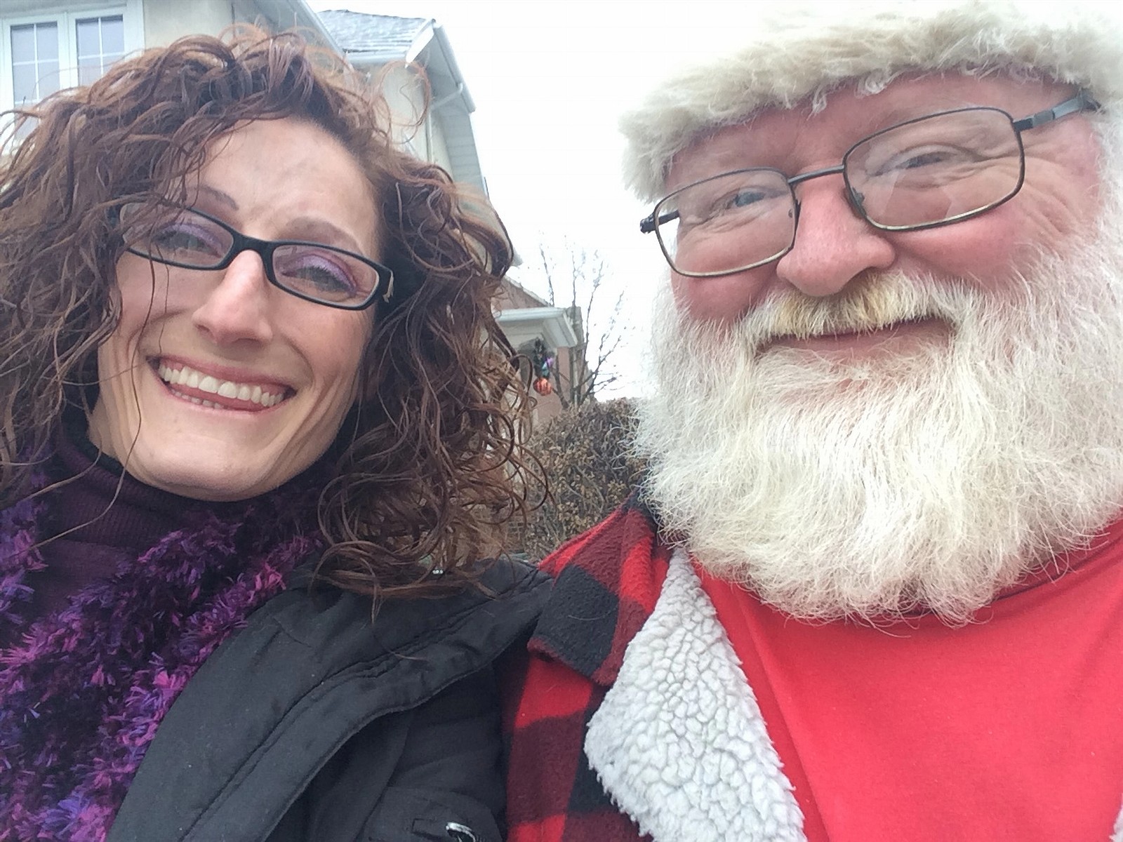 Adriana Violo with Santa at a Toronto community Christmas event